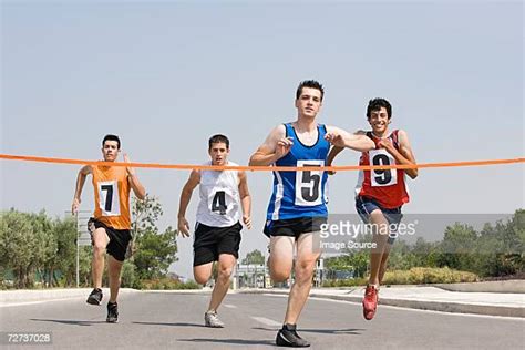 Male Running Finish Line Photos And Premium High Res Pictures Getty