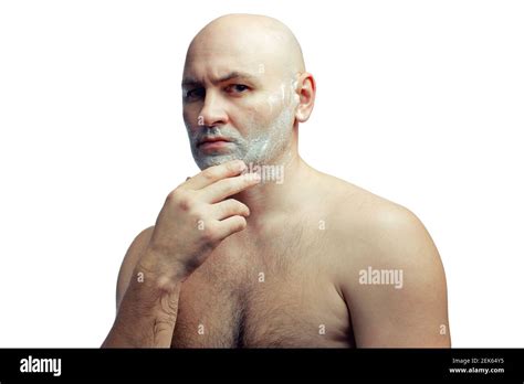 A Bald White Man Prepares To Shave His Stubble A Mans Face With