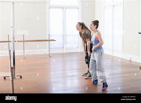 Two Teenage Girls Doing Warm Up Dance In Ballet School Stock Photo Alamy