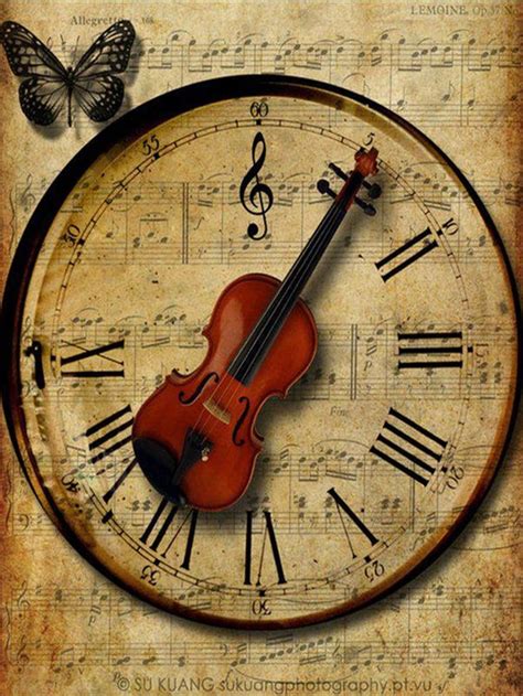 Highly decorative musical clock playing nostalgic, classical and christmas melodies. Old fashioned clock with violin as hands pointing to Roman ...