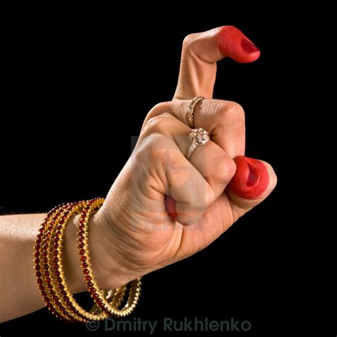 woman hand showing tamrachuda hasta hand gesture also called mudra meaning rooster of