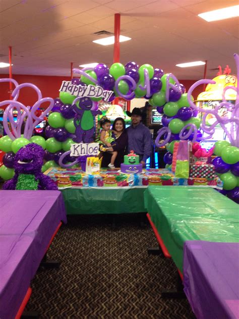 Balloon Garland Decoration For A Barney Birthday Party Artofit