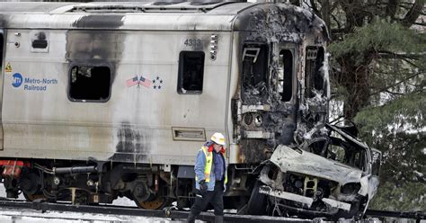 Investigators Examine Burned Wreckage In Deadly Train Crash