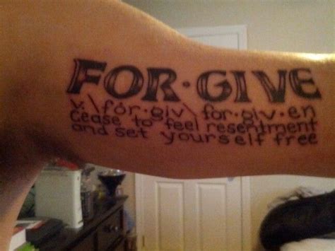 A Person With A Tattoo On Their Arm That Reads For Give And The Words