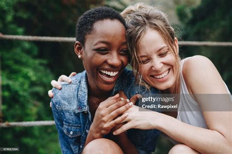 Happy Friends Holding Each Other High Res Stock Photo Getty Images