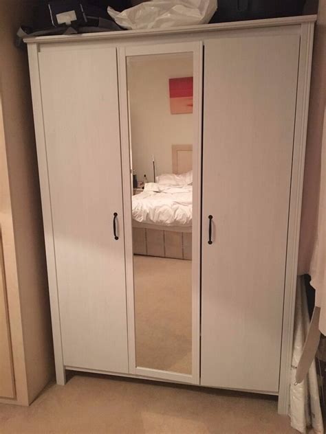 Brimnes wardrobe with 3 doors, white, 46x74 3/4. Wardrobe with 3 doors (includes a mirror)- BRUSALI - Ikea ...
