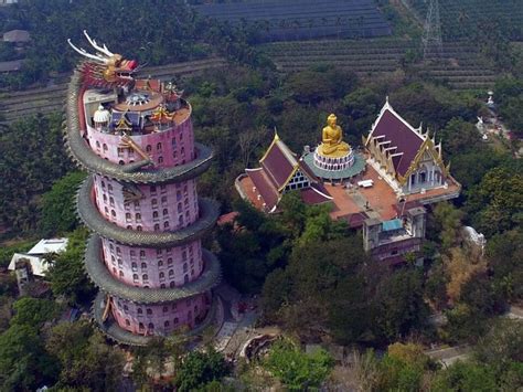A 17 Story Dragon Climbs Thailands Pink 80 Meter Buddhist Temple