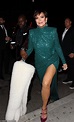 Kris Jenner is dressed to party in glitzy green gown with a racy thigh ...