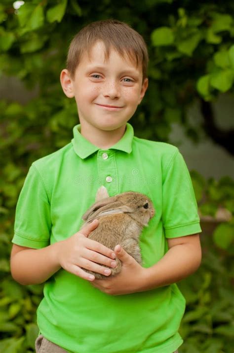 The Little Boy With A Rabbit In The Hands Stock Image Image Of Boys