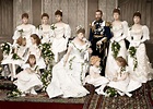 an old black and white photo of people in wedding dresses