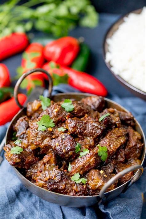 Add the paste to the pan, the kaffir lime leaves and stir for a couple of minutes. Beef Rendang - Slow-cooked fall apart spicy beef with a ...