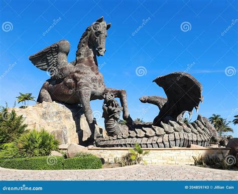 Giant Statue Of Pegasus Defeating A Dragon Editorial Stock Photo