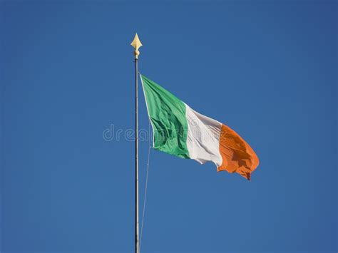Irish Flag Of Ireland Over Blue Sky Stock Photo Image Of Flag