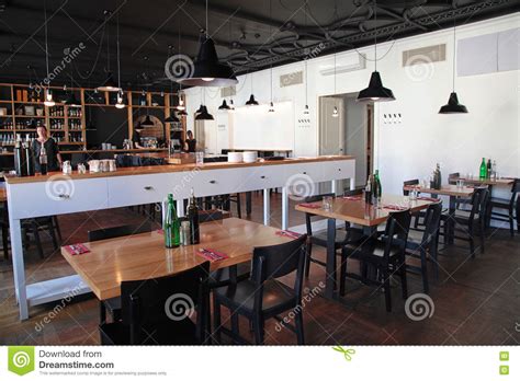 Modern Cafe With Cozy Interior And With Open Kitchen Editorial Stock