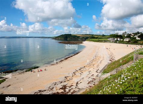 Still Sea And White Clouds At Gyllyngvase Beach In Falmouth Cornwall