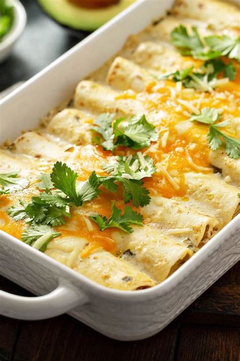 By doubling the recipe, you don't double the workload, and can make 4 smaller pans of enchiladas that you can use any other time. This Sour Cream Chicken Enchiladas recipe will have everyone begging for more! Made with home ...