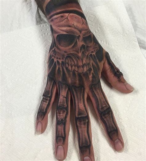 Skull Bone Hand Tattoo Skull Hand Tattoos Designs Ideas And Meaning Skull Hand Tattoo