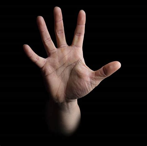 Open Palm Hand Reaching Out Into Darkness Stock Photos Pictures