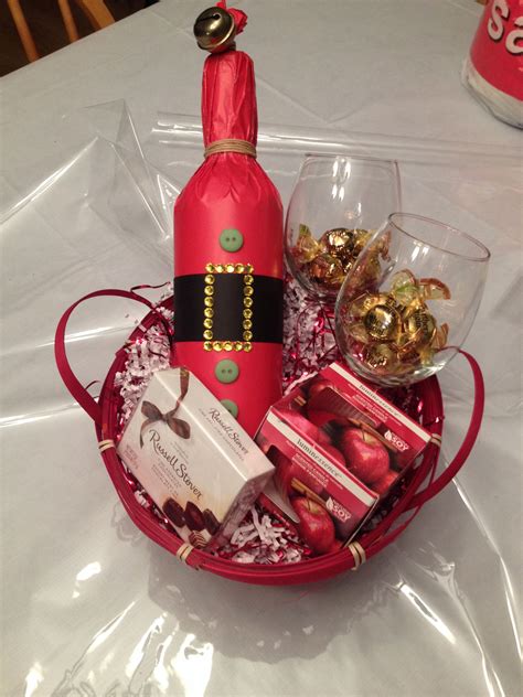 T Basket For Two Includes Bottle Of Wine Santa Wrap 2 Wine Glasses Candle And Some