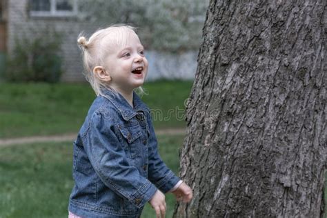 Funny Laughing Little Girl Outside Blonde Child Girl Smiling And