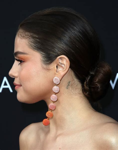 If you are looking to follow in the steps of the singer, then hang on to this article. Selena Gomez's "G" Tattoo | What Do All of Selena Gomez's ...