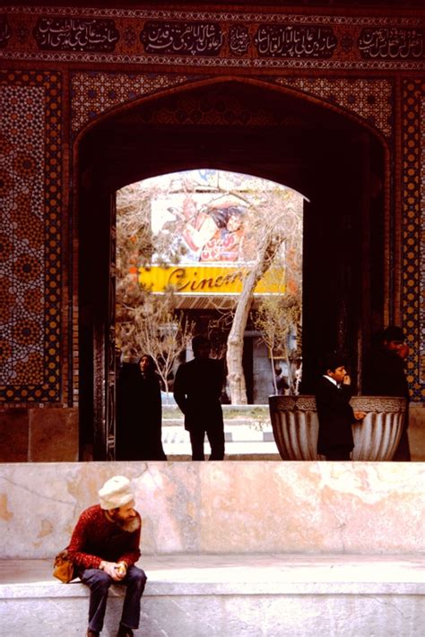 a typical movie house in tehran showing both foreign and iranian movies