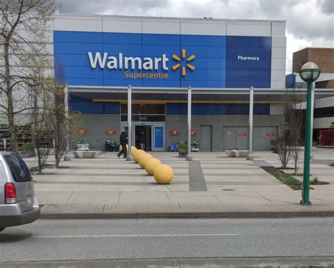 Former Target turned into a Walmart, they painted the Target orbs yellow instead of removing ...