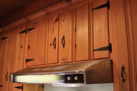 Fortunately, it can be restored by cleaning it like you would most other pieces of wood. A knotty pine kitchen - respectfully retained and revived