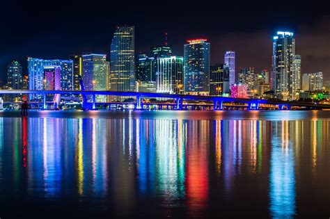 The Miami Skyline At Night Seen From Watson Island Miami Florida