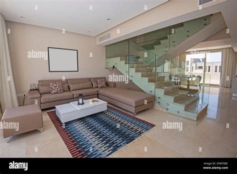 Living room lounge area in luxury duplex apartment show home showing
