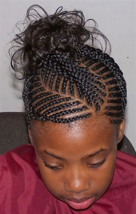 Cornrow hair into a high ponytail and braid loose hair into a fishtail braid adding texturizing hair spray to help hold the braid. Hair Braid Encyclopedia: Cornrow Braids Kids