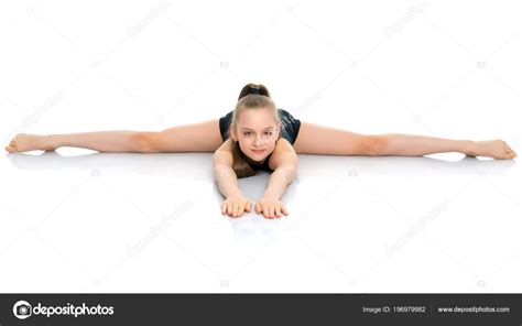 Girl Gymnast Perform The Twine Exercise Stock Photo By Lotosfoto1