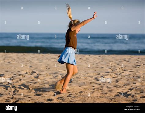 Young Girl Doing A Handstand On The Beach Stock Photo Alamy