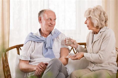 Elder Husband And Wife Having A Tea And Cake Together At The Table Stock Image Image Of Cane