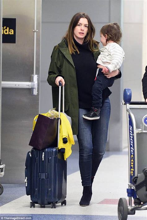 Anne Hathaway Carries Son Jonathan As She Jets Into New York Daily