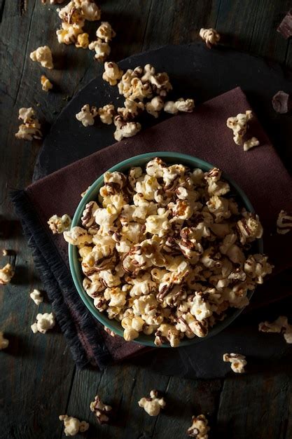 Premium Photo Homemade Chocolate Drizzled Caramel Popcorn