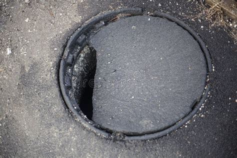 A Hole In The Pavement Damaged Sunroof Stock Photo Image Of