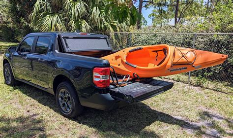 Ready To Go Kayaking With Custom Kayak Rack Holder In Bed