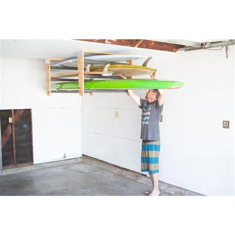 Bekijk meer ideeën over surf kamer, surfplank how to make a coat rack from surf board fins | debis design diary. Rolling Rack Ceiling Mount Multiple Boards in 2020 | Kayak ...
