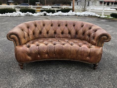 Its expansive design combines dark brown leather. Curved Light Brown Italian Leather Chesterfield Sofa at ...