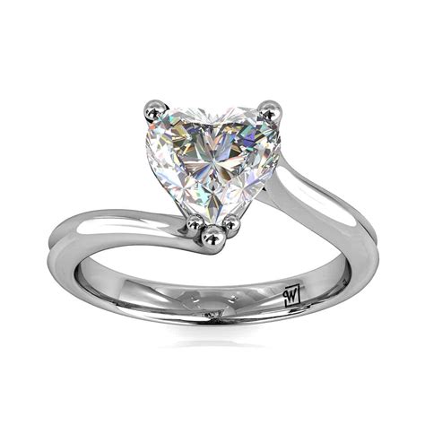 A heart shaped diamond is a unique statement of love. Heart Shaped Diamond Solitaire Engagement Ring