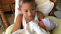 10/12/2014: Evan Ryan Hold His Baby Brother, Kalel Elijah, for the ...