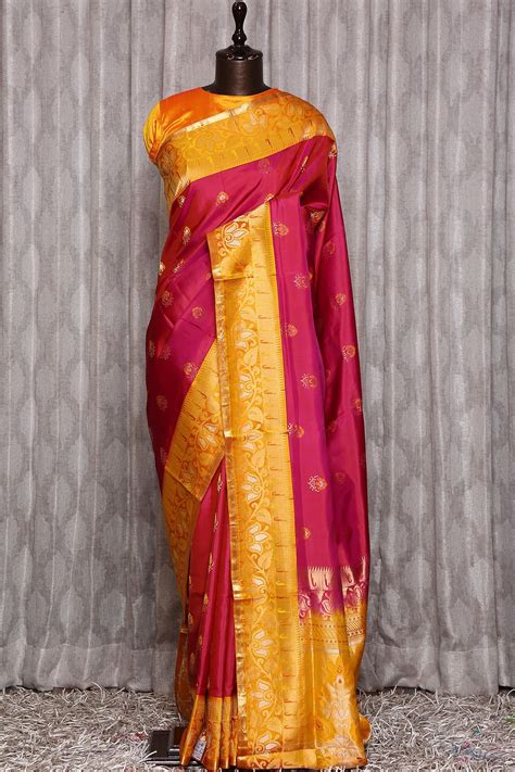 Be Glorious And Look Stunning By Draping This Beautiful Silk Saree In Pink And Yellow Dual Tone