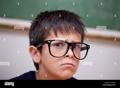 Close Up Of A Serious Schoolboy Stock Photo Alamy