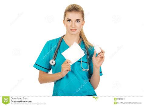 female nurse holding gauze and hydrogen peroxide royalty free stock image