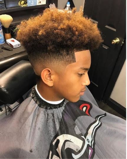 Flat top fade (box fade) with hard part. 65 Black Boys Haircuts 2021 - A Chic And Stylish Black ...