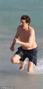 Paul Mccartney Frolics In The Sea With Wife Nancy Shevell Daily Mail