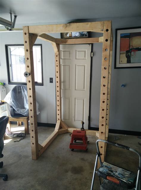 If you've been working out for quite some time, you know the benefits of a good squat session and the power rack is just the thing you need for your home gym. wooden squat rack - Google Search | Home gym design, Home ...
