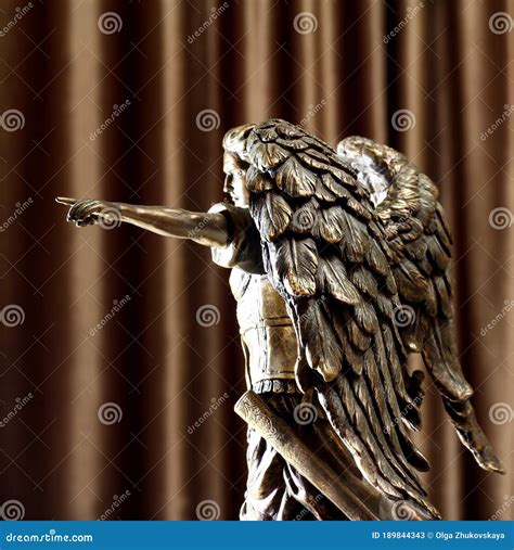 Statuette Of Archangel Michael With Wings And Sword Stock Photo