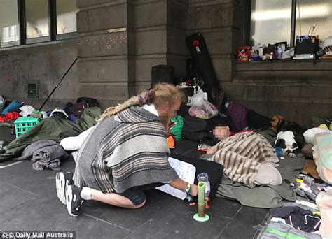 Homeless Man Holds Up Sign Asking For Drug Money Melbourne Daily Mail